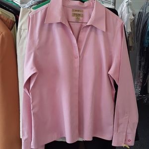 Pink, collared blouse.